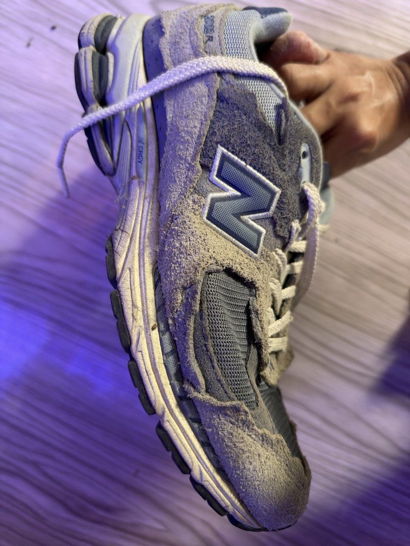 New Balance 2002R Protection Pack Rain Cloud Size 10.5M (Category: Sneakers) located in Caloocan City. Submitted by nic834427 (Listing ID 1470617078, Image 3). Description: New Balance 2002R sneakers, grey and blue colorway. Raw edges on the suede panels. Classic 2002R branding on the heel and tongue. Mesh underlays across the upper. Chunky rubber sole with ABZORB cushioning. Size US 10.5 men's. Regular signs of wear on the soles and inner lining