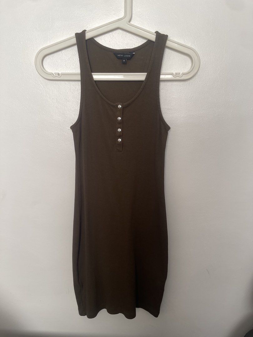 New Look Brown Ribbed Button Front Mini Dress Size 6 (Category: Dresses) located in Manila. Submitted by lovedbymidge (Listing ID 1470647343, Image 1). Description: 🩷 for xs-s girlies 🚚 lalamove or grab express (sf shouldered by the buyer!) - Brand: New Look - Size: 6 - Color: Brown - Style: Sleeveless tank mini dress with a fitted silhouette - Details: Scoop neckline with functional front buttons - Material: Soft and stretchy ribbed fabric.