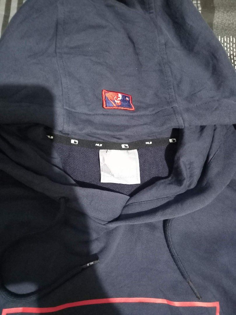 New York Yankees MLB Hoodie Navy Blue Pullover (Category: Coats, Jackets and Outerwear) located in Panabo. Submitted by khimmyirish_ki021126 (Listing ID 1470582884, Image 2). Description: - Authentic MLB Genuine Merchandise New York Yankees hoodie - Color: Navy blue with red and white chest graphic - Size: Pit-to-pit measures 22-23 inches - Features: Drawstring hood, ribbed cuffs and hem - Condition: Clean fabric, very comfortable for daily wear.