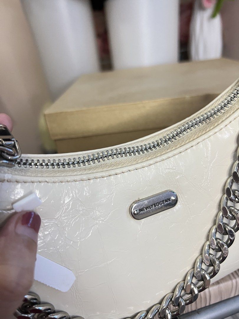 Newly & Ocean crescent-shaped bag (Category: Shoulder Bags) located in Quezon City. Submitted by handpicked_collections_ph (Listing ID 1470657711, Image 3). Description: .