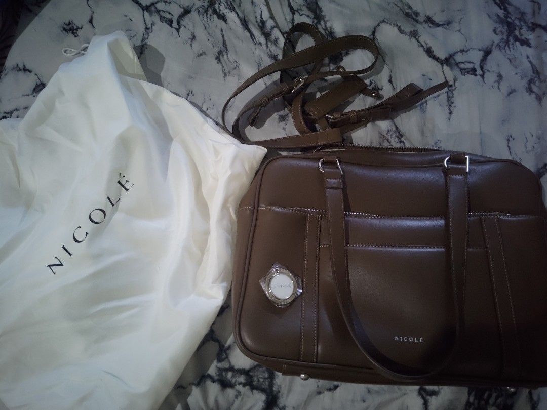 Nicole tote style bag in brown (Category: Tote Bags) located in San Fernando. Submitted by masterambrose13 (Listing ID 1470740334, Image 2). Description: .