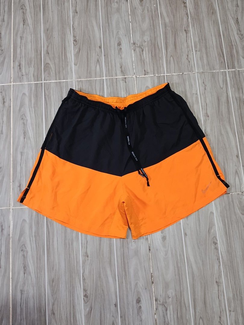 NIKE 2TONE DRIFIT RUNNING SHORT (freeshipping) (Category: Activewear) located in Quezon City. Submitted by gyl-stop (Listing ID 1470683268, Image 1). Description: free shipping 28-35 x 16 very good condi cr: 9.5/10 issue: fade Nike logo.