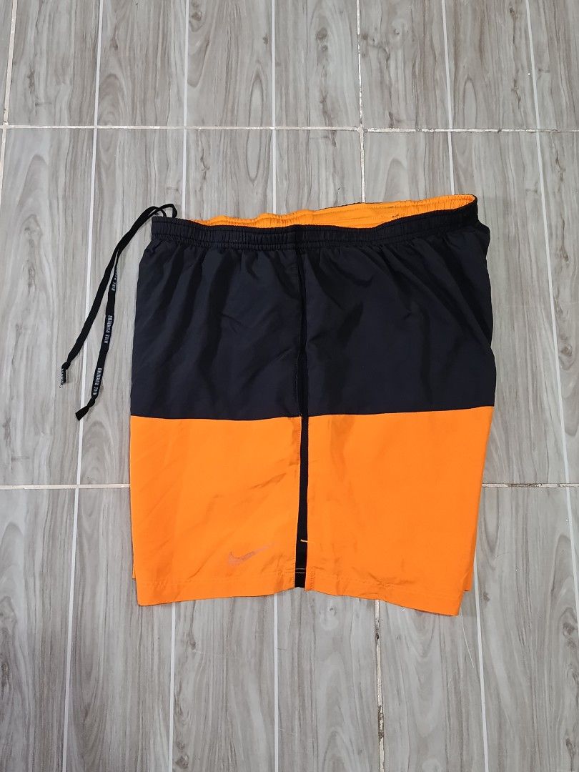 NIKE 2TONE DRIFIT RUNNING SHORT (freeshipping) (Category: Activewear) located in Quezon City. Submitted by gyl-stop (Listing ID 1470683268, Image 3). Description: free shipping 28-35 x 16 very good condi cr: 9.5/10 issue: fade Nike logo.