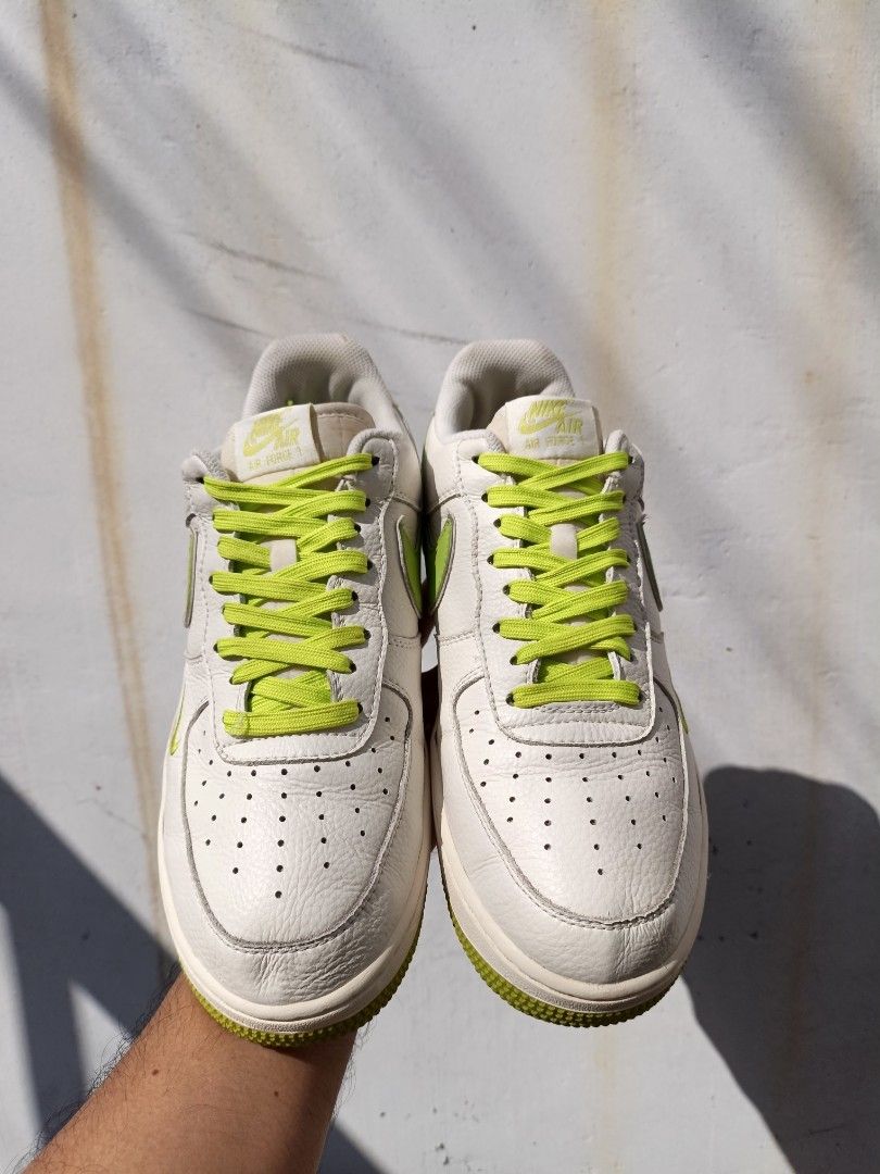 Nike Air Force 1 'Fresh' Lime Green (Category: Sneakers) located in Imus. Submitted by grindhouse.thriftshop (Listing ID 1470631704, Image 2). Description: - Brand/Model: Nike Air Force 1 Low - Colorway: White tumbled leather with neon lime green swoosh, laces, outsole, and branding - Special Detail: 'fresh' stitched cursive text near the heel - Size: US 9.5 - Condition: Clean soles with minimal wear, highly vibrant look.
