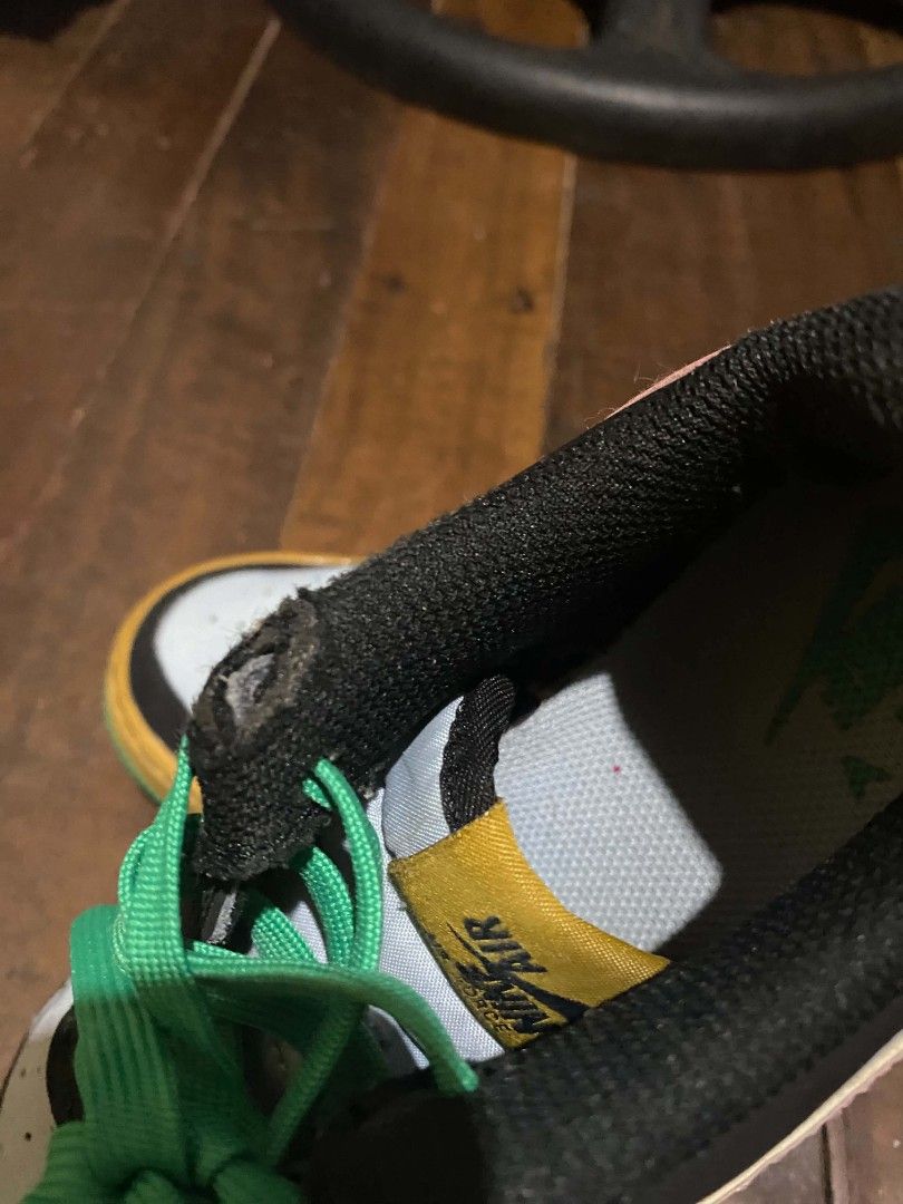 Nike Air Force 1 Low Multicolour (Category: Babies & Kids Fashion) located in Navotas City. Submitted by piozonvhon (Listing ID 1470567246, Image 1). Description: Multicolour Nike Air Force 1 Low sneakers. Bold mix of black, yellow, pink, light blue, and green panels. Bright green laces. Yellow tongue tag with Nike branding. Upside down Nike Air logo embroidered on the heel tabs. Visible wear on the collar lining with a small rip. Pink and green 