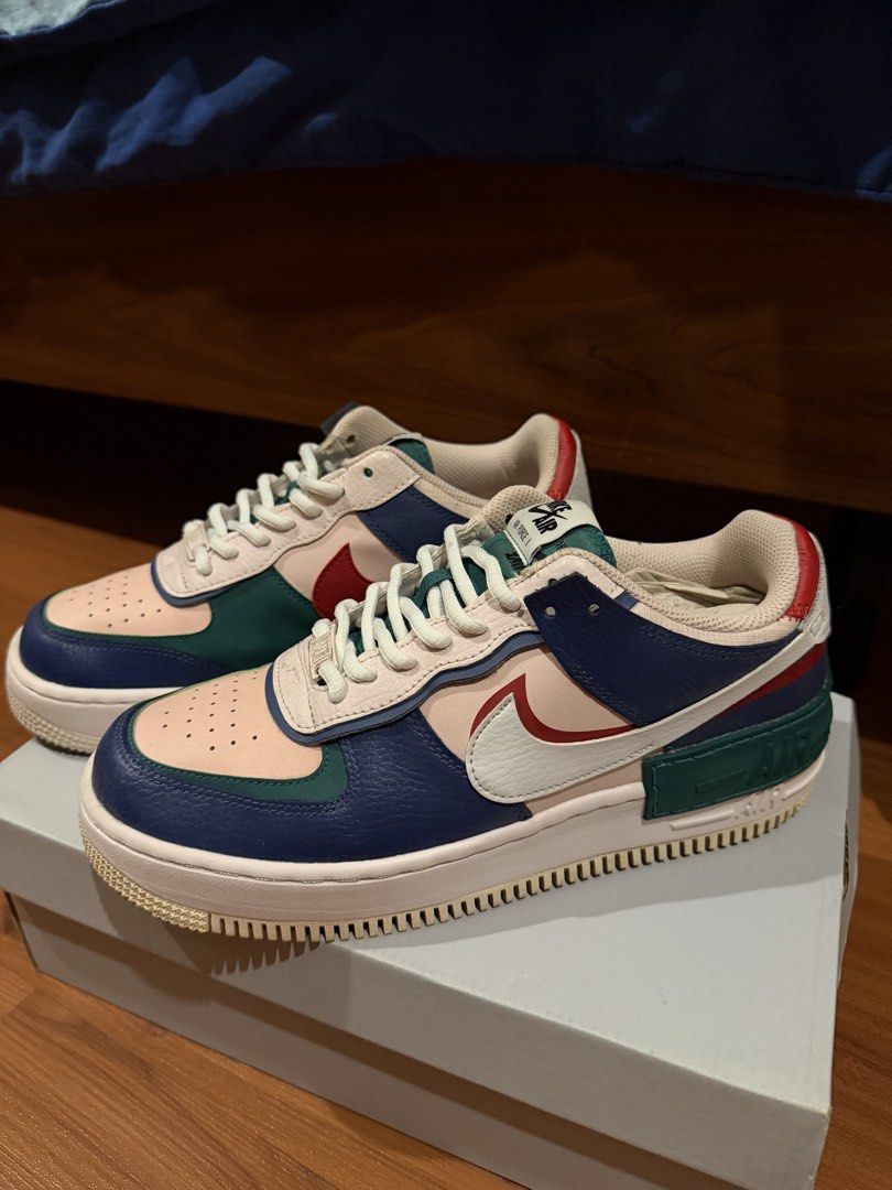 Nike Air Force 1 Shadow Multi-Color Sneakers with Box (Category: Sneakers) located in Paranaque City. Submitted by preloveditems111 (Listing ID 1470566540, Image 1). Description: - Authentic Nike Air Force 1 Shadow sneakers - Vibrant multi-color design with pink, blue, green, and red panels - Trendy layered aesthetic featuring double branding details - Excellent pre-loved condition with very minimal wear on soles and a clean overall shape - Inclu