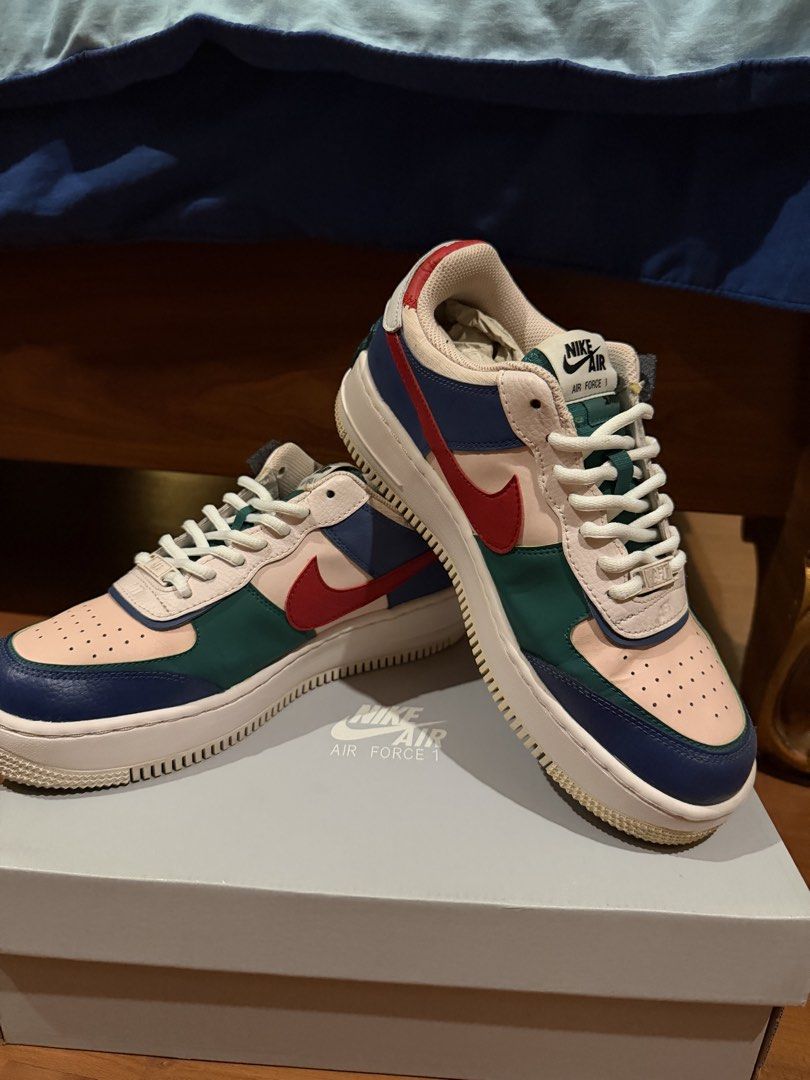 Nike Air Force 1 Shadow Multi-Color Sneakers with Box (Category: Sneakers) located in Paranaque City. Submitted by preloveditems111 (Listing ID 1470566540, Image 2). Description: - Authentic Nike Air Force 1 Shadow sneakers - Vibrant multi-color design with pink, blue, green, and red panels - Trendy layered aesthetic featuring double branding details - Excellent pre-loved condition with very minimal wear on soles and a clean overall shape - Inclu
