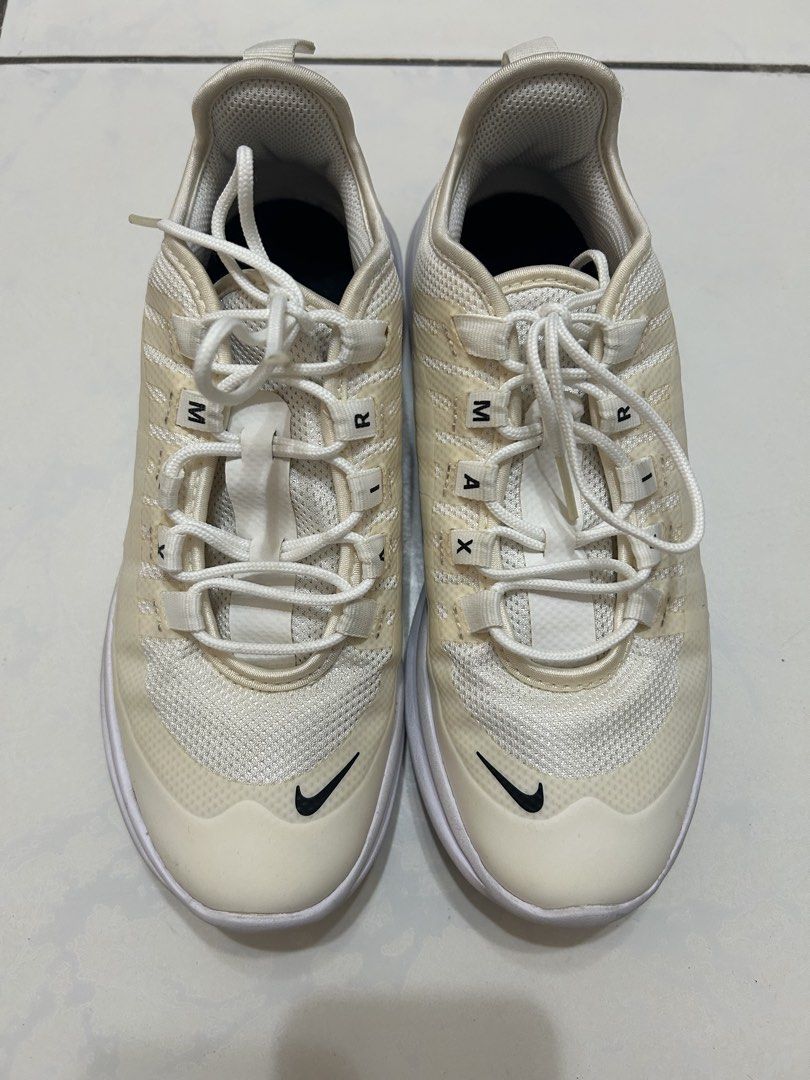 Nike Air Max Axis White Youth Size 4Y (Category: Babies & Kids Fashion) located in Davao. Submitted by jgalicia (Listing ID 1470573922, Image 2). Description: - Brand: Nike - Model: Air Max Axis (AH5222-100) - Colorway: White and cream with black details - Size: Youth 4Y / EU 36 / UK 3.5 / 23 cm - Material: Breathable mesh upper with secure lacing - Details: Iconic side and toe Swoosh, distinct Air Max lacing loop branding - Condition: Yellowish 
