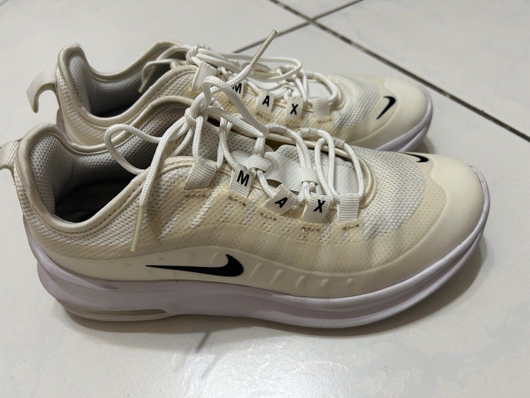 Nike Air Max Axis White Youth Size 4Y (Category: Babies & Kids Fashion) located in Davao. Submitted by jgalicia (Listing ID 1470573922, Image 1). Description: - Brand: Nike - Model: Air Max Axis (AH5222-100) - Colorway: White and cream with black details - Size: Youth 4Y / EU 36 / UK 3.5 / 23 cm - Material: Breathable mesh upper with secure lacing - Details: Iconic side and toe Swoosh, distinct Air Max lacing loop branding - Condition: Yellowish 