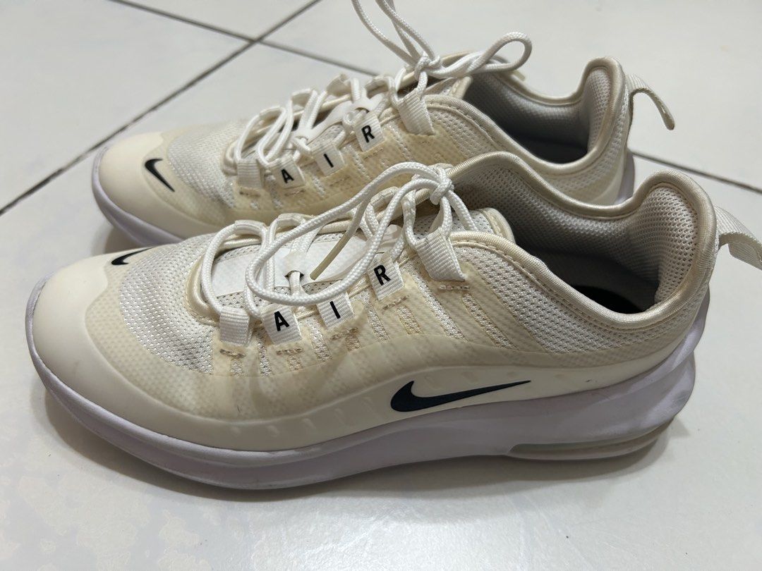 Nike Air Max Axis White Youth Size 4Y (Category: Babies & Kids Fashion) located in Davao. Submitted by jgalicia (Listing ID 1470573922, Image 3). Description: - Brand: Nike - Model: Air Max Axis (AH5222-100) - Colorway: White and cream with black details - Size: Youth 4Y / EU 36 / UK 3.5 / 23 cm - Material: Breathable mesh upper with secure lacing - Details: Iconic side and toe Swoosh, distinct Air Max lacing loop branding - Condition: Yellowish 