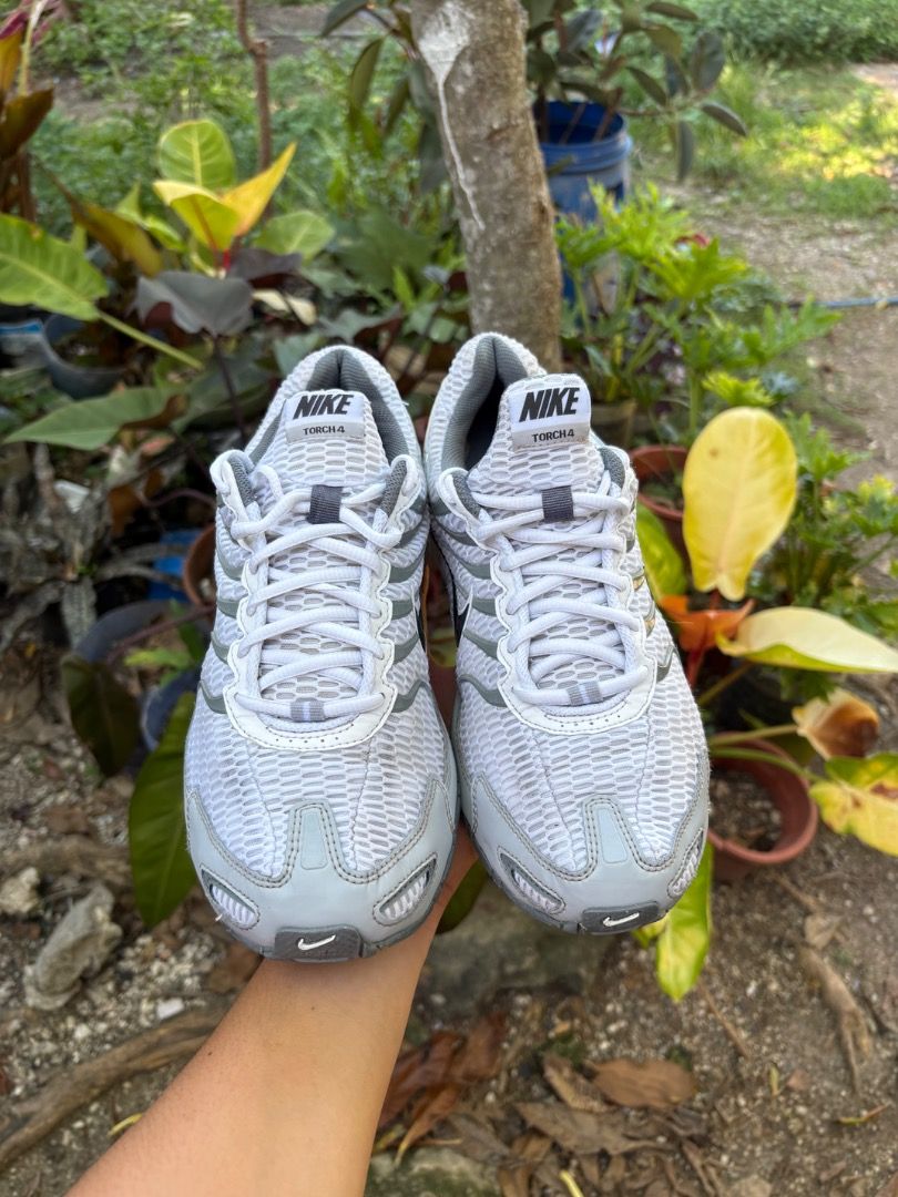 Nike Air Max Torch 4 White Grey Size US 9 (Category: Sneakers) located in Danao, Cebu. Submitted by kentoy25 (Listing ID 1470621516, Image 3). Description: - Brand: Nike Air Max Torch 4 - Color: White and Grey - Size: Men's US 9 / UK 8 / EUR 42.5 - Features: Breathable mesh upper, iconic side swoosh, chunky sole with visible Air Max heel cushioning - Condition: 2024 release, great for daily wear and very comfortable.