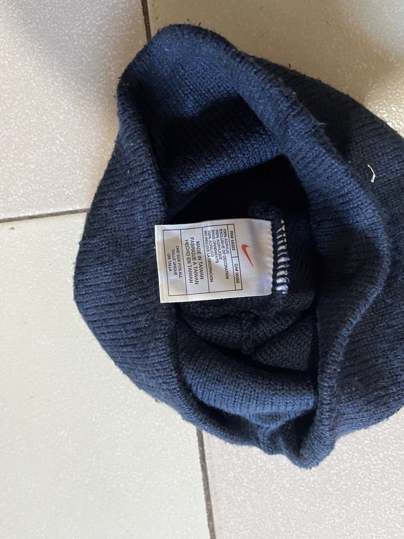 Nike Air Navy Blue Beanie Hat (Category: Caps & Hats) located in Siniloan. Submitted by marceiron316276 (Listing ID 1470563943, Image 2). Description: - Brand: Nike Air - Color: Navy blue - Material: 100% acrylic - Origin: Made in Taiwan - Size: One size fits all - Care: Hand wash only - Condition: Great winter accessory.