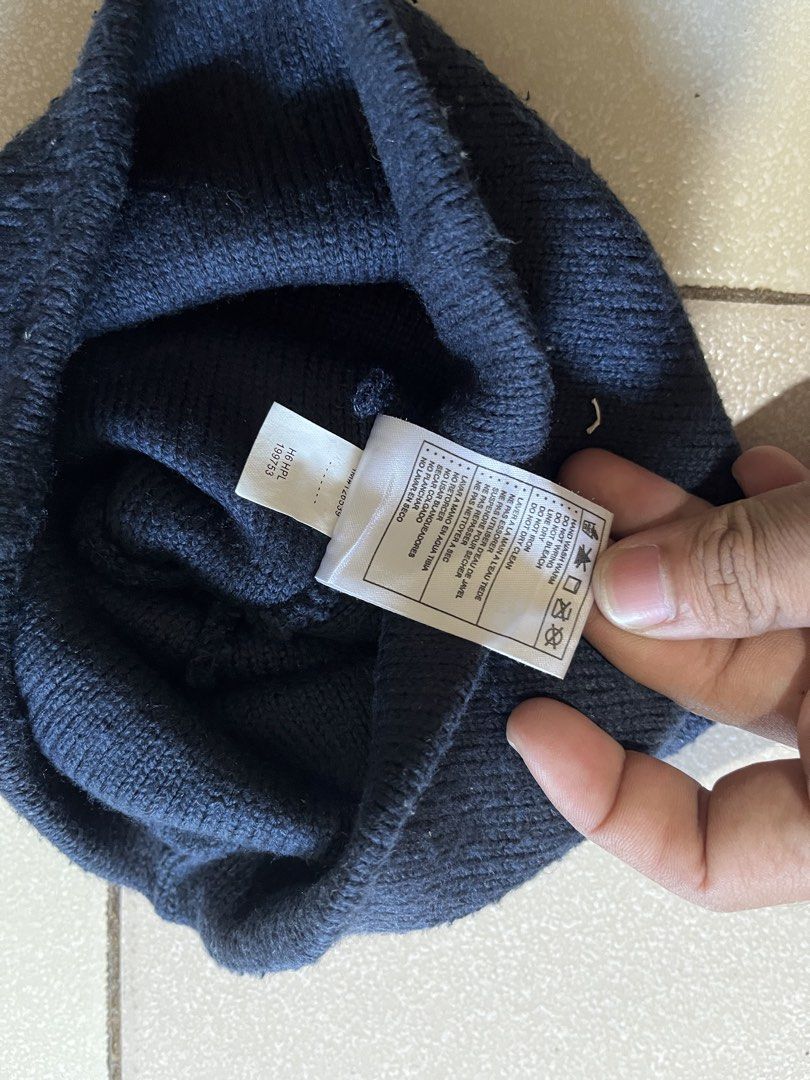 Nike Air Navy Blue Beanie Hat (Category: Caps & Hats) located in Siniloan. Submitted by marceiron316276 (Listing ID 1470563943, Image 3). Description: - Brand: Nike Air - Color: Navy blue - Material: 100% acrylic - Origin: Made in Taiwan - Size: One size fits all - Care: Hand wash only - Condition: Great winter accessory.