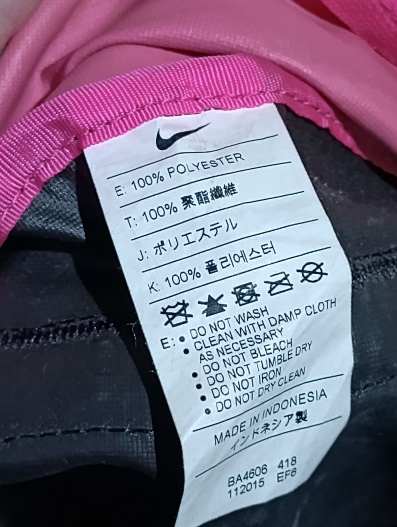 Nike BA4606 418 Multi-color Mini Backpack (Category: Backpacks) located in Abucay. Submitted by lovedby.herrr (Listing ID 1470677889, Image 3). Description: Vibrant Nike color block backpack in bright blue, hot pink, and black. Features a front zipped pocket with embroidered swoosh, adjustable straps, and durable 100% polyester material. Style code: BA4606 418..