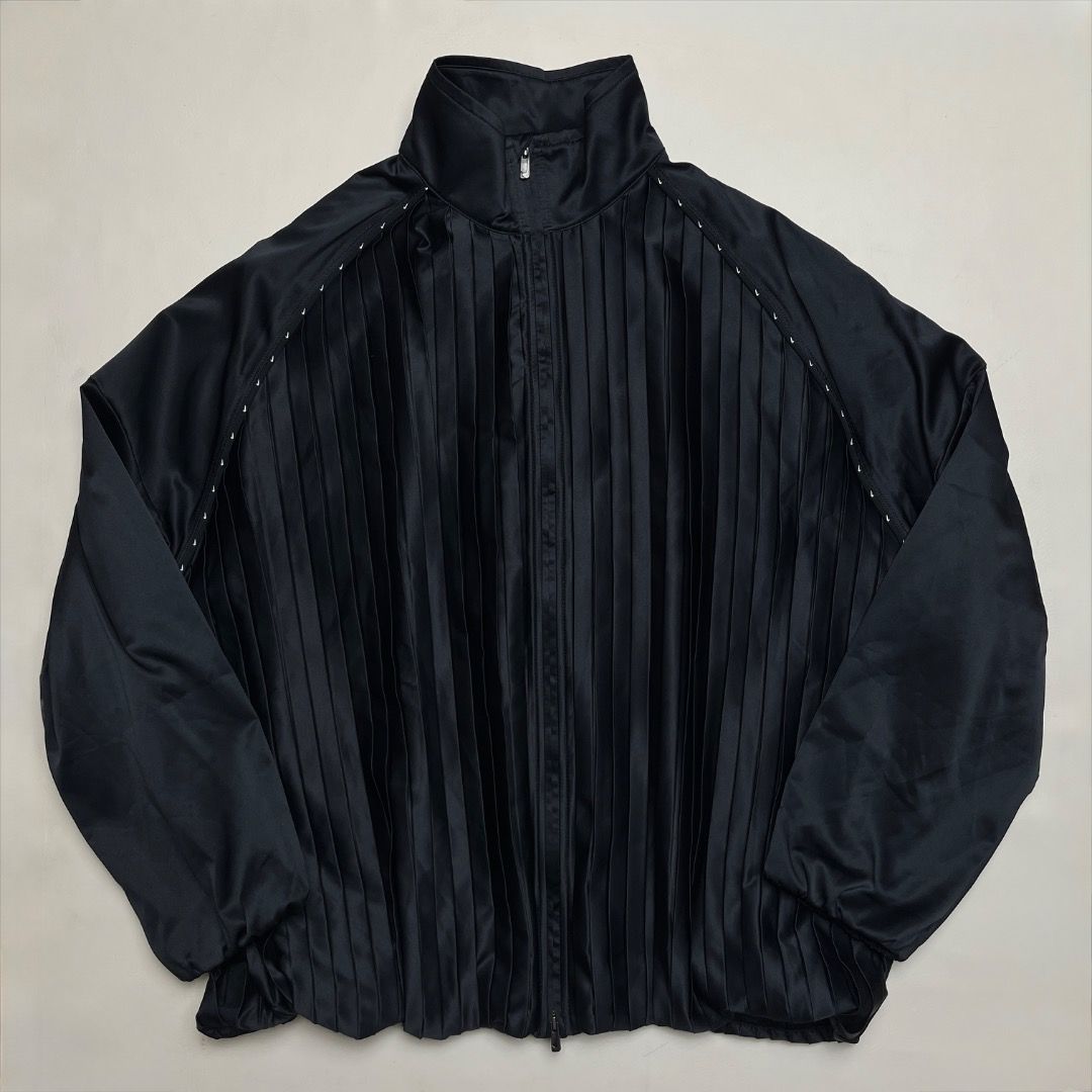 Nike Black Pleated Track Jacket (Category: Coats, Jackets and Outerwear) located in Caloocan City. Submitted by achilles_grails (Listing ID 1470727106, Image 1). Description: - Brand: Nike - Item: Full-Zip Track Jacket - Color: Black - Size: L (Tag intact) - Design: Unique pleated front and back panels - Material: Body: 96% polyester, 4% spandex | Lining: 79% polyester, 21% spandex - Features: Breathable mesh interior lining, mock neck collar, ri