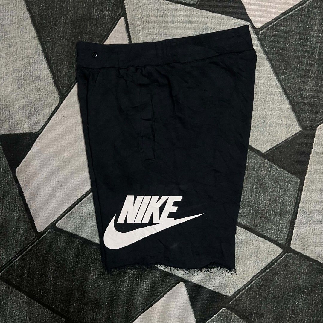 Nike Black Shorts with Big Logo Print (Category: Shorts) located in Cebu City. Submitted by royalwolf-2a85 (Listing ID 1470694277, Image 1). Description: - Color: Classic black with large white Nike logo on the leg - Design: Stylish raw hem finish for a streetwear look - Waistband: Comfortable elastic waistband with drawstring eyelets - Pockets: Two front pockets and one back pocket featuring an iconic orange Nike tag - Versatility: Great for dai
