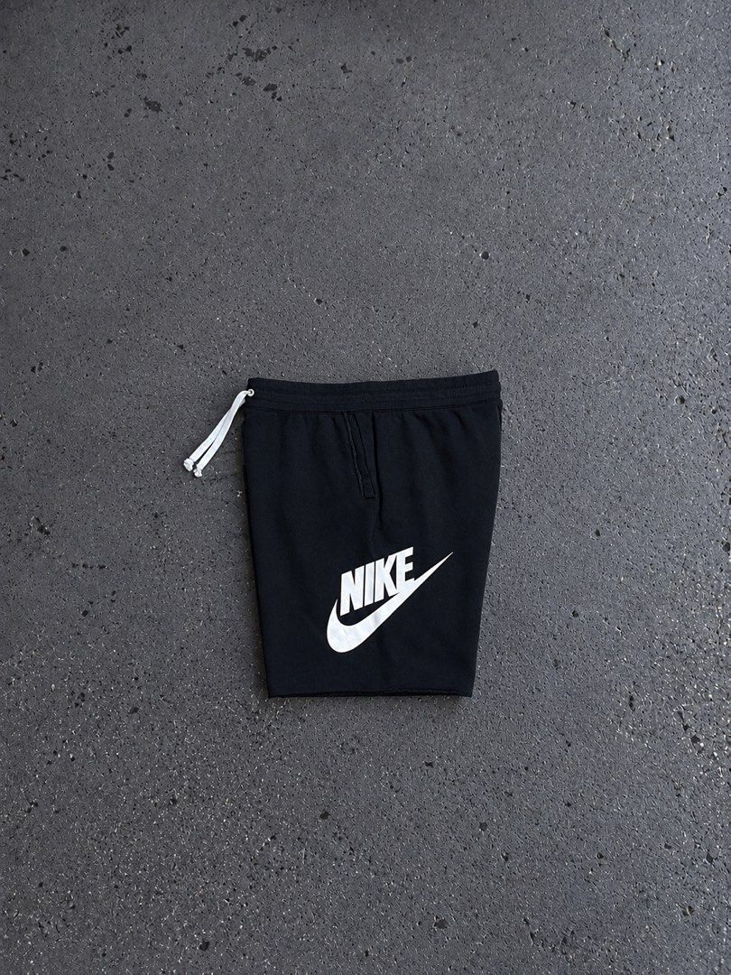 Nike Black Shorts with White Swoosh (Category: Shorts) located in Polangui. Submitted by thrift2house (Listing ID 1470579138, Image 1). Description: - Authentic black Nike shorts with a bold white logo near the hem - Comfortable elastic waistband with stylish contrasting white drawstrings on the left side - Made from soft, breathable cotton material in a standard fit - Versatile design ideal for workouts, lounging, or casual daily wear - Conditio