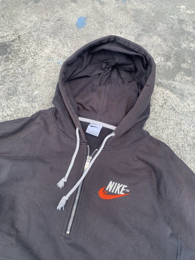 Nike Brown Quarter Zip Hoodie (Category: Coats, Jackets and Outerwear) located in Tarlac. Submitted by durkk4ever (Listing ID 1470722267, Image 2). Description: - Brand: Nike - Style: Quarter-zip hoodie with metal zipper closure and white adjustable drawstring hood - Color: Dark Brown - Size: L - Material: 98% cotton, 2% spandex (Made in Pakistan) - Details: Embroidered retro Nike swoosh logo on chest, front kangaroo pocket, and ribbed side panel