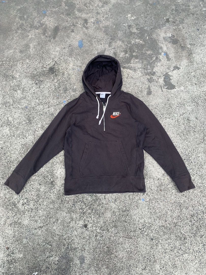 Nike Brown Quarter Zip Hoodie (Category: Coats, Jackets and Outerwear) located in Tarlac. Submitted by durkk4ever (Listing ID 1470722267, Image 1). Description: - Brand: Nike - Style: Quarter-zip hoodie with metal zipper closure and white adjustable drawstring hood - Color: Dark Brown - Size: L - Material: 98% cotton, 2% spandex (Made in Pakistan) - Details: Embroidered retro Nike swoosh logo on chest, front kangaroo pocket, and ribbed side panel