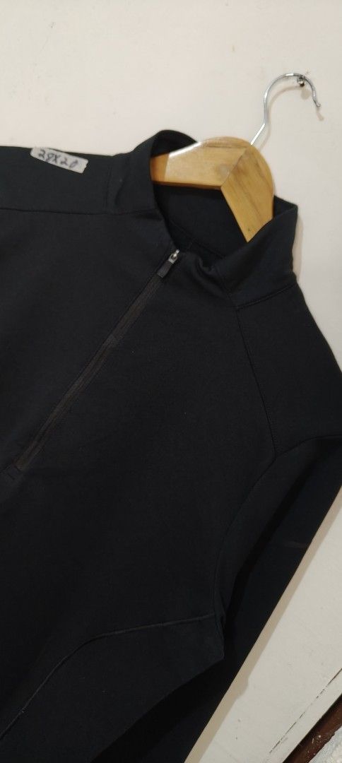 Nike Dri-Fit Black 1/4 Zip Pullover (Category: Coats, Jackets and Outerwear) located in Bulacan. Submitted by adrian2325 (Listing ID 1470641726, Image 2). Description: - Brand: Nike - Style: Dri-Fit quarter-zip mock neck pullover - Color: Solid Black - Size: Medium (tag at collar) - Material: 100% lightweight polyester - Origin: Made in Thailand - Condition: Clean overall shape, great for workouts or casual wear.