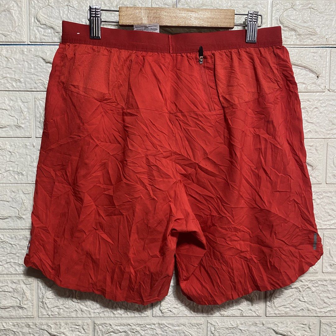 Nike Dri-FIT Red Running Shorts Size S (Category: Shorts) located in Naga. Submitted by thesource4400 (Listing ID 1470674673, Image 2). Description: - Brand: Nike - Item: Running Shorts - Color: Red - Size: Small (on tag) - Condition: Excellent - Material: Dri-FIT lightweight fabric with breathable mesh side panels - Features: Elastic waistband with inner drawstring, secure back zippered pocket, and reflective Nike swoosh logo - Origin: Made in C