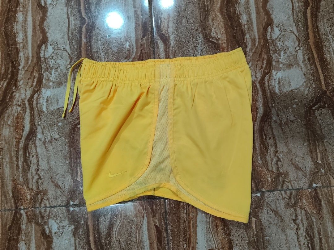 Nike Dri-Fit Running Short (Category: Activewear) located in General Santos City (Dadiangas). Submitted by alfredanth42291 (Listing ID 1470618025, Image 2). Description: NIKE RUNNING SHORT neon yellow womens M W: 28-37 L: 12 -w/ drawstring -w/ inner brief -w/ inner pocket -100% polyester ✓excellent condition 250 #trail #sports #pickleball #outdoor #gym.