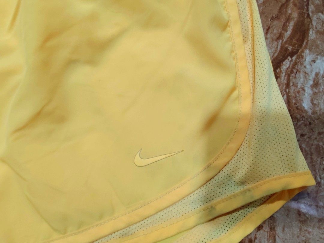 Nike Dri-Fit Running Short (Category: Activewear) located in General Santos City (Dadiangas). Submitted by alfredanth42291 (Listing ID 1470618025, Image 3). Description: NIKE RUNNING SHORT neon yellow womens M W: 28-37 L: 12 -w/ drawstring -w/ inner brief -w/ inner pocket -100% polyester ✓excellent condition 250 #trail #sports #pickleball #outdoor #gym.