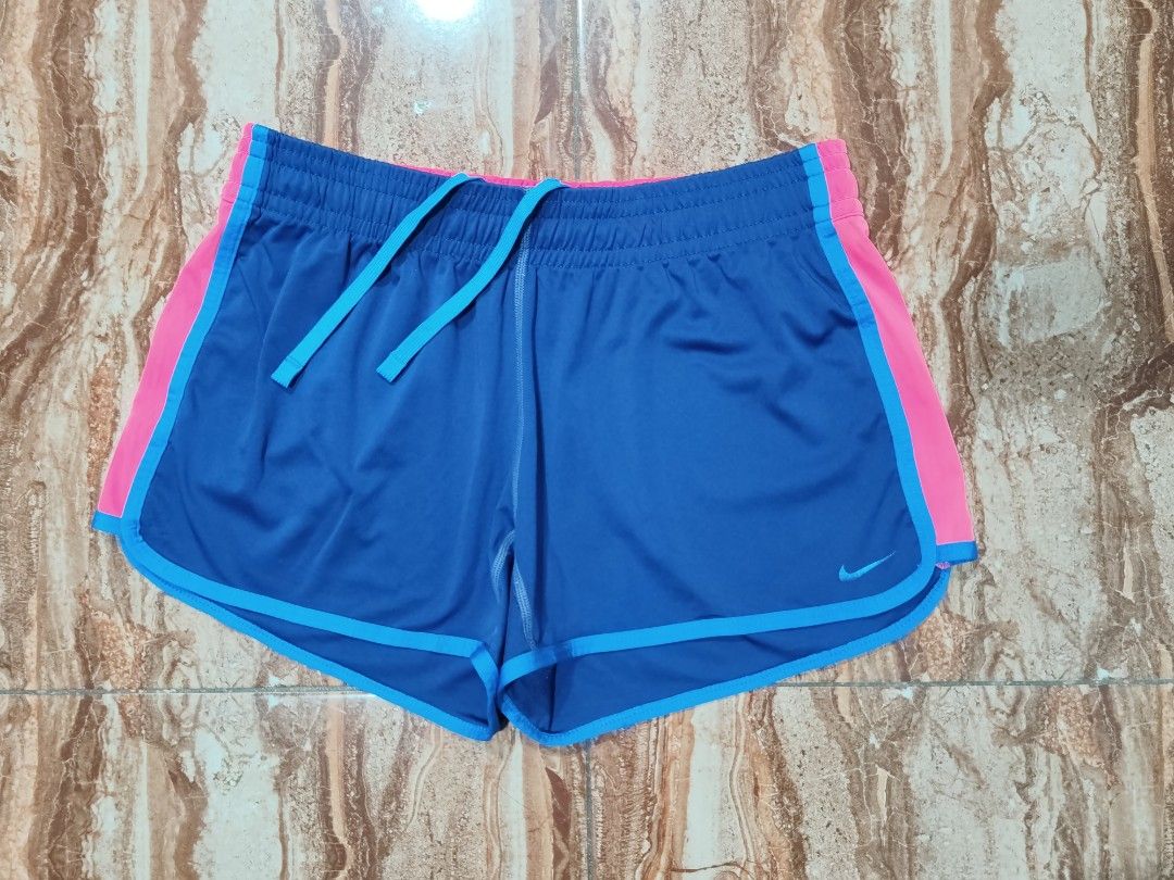 Nike Dri-Fit Short (Category: Activewear) located in General Santos City (Dadiangas). Submitted by alfredanth42291 (Listing ID 1470620116, Image 1). Description: NIKE DRI-FIT SHORT blue/neon orange womens M W: 30-38 L: 11 -w/ drawstring -100% polyester ✓excellent condition 235 #sports #running #pickleball #gym.