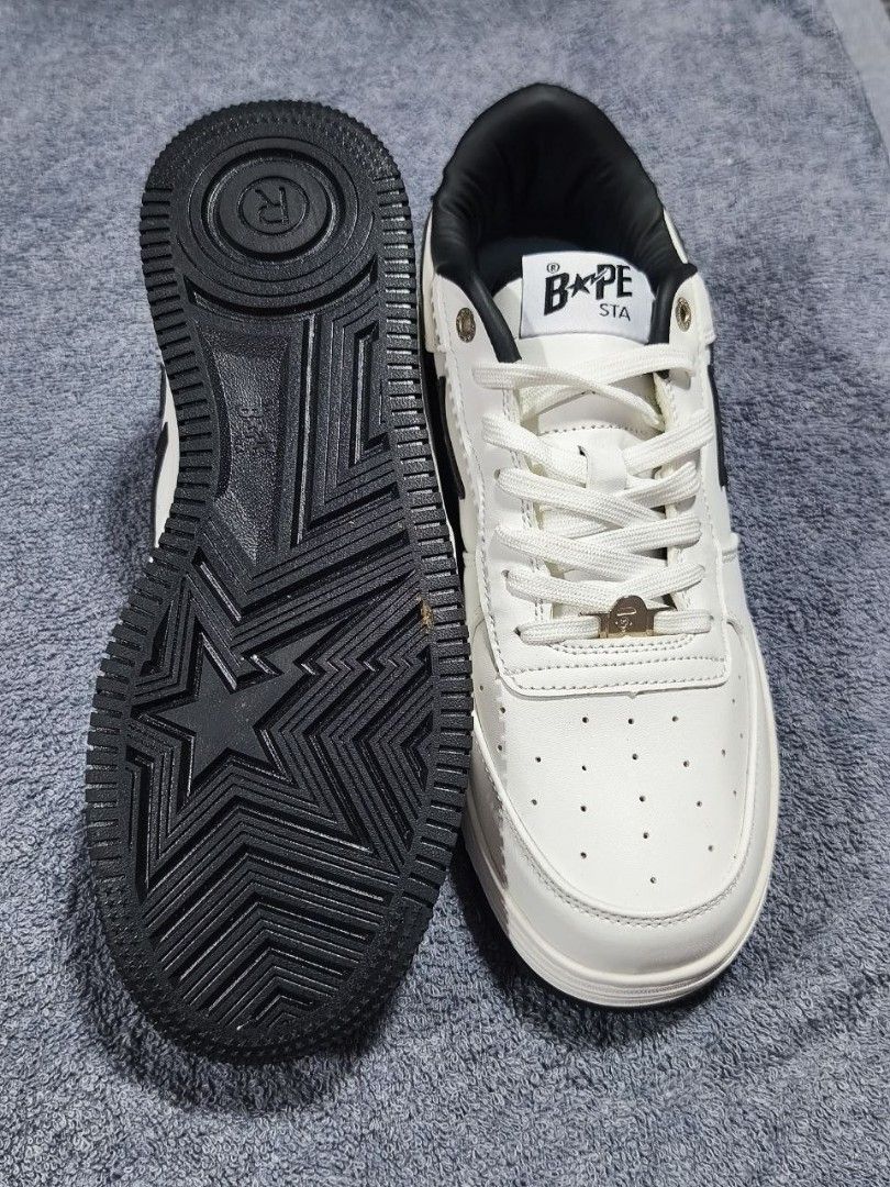 Nike Dunk Low LBWK & BAPE STA Sneakers (Category: Sneakers) located in Manila. Submitted by kikocastro37272 (Listing ID 1470694595, Image 1). Description: - Bundle includes 2 pairs of versatile sneakers, perfect for daily wear and street style - Pair 1: Cream upper, black laces, and striking LBWK text on the toe area - Pair 2: Clean white leather with black accents, BAPE STA tongue branding, and convenient lace locks - Both pairs feature durable 