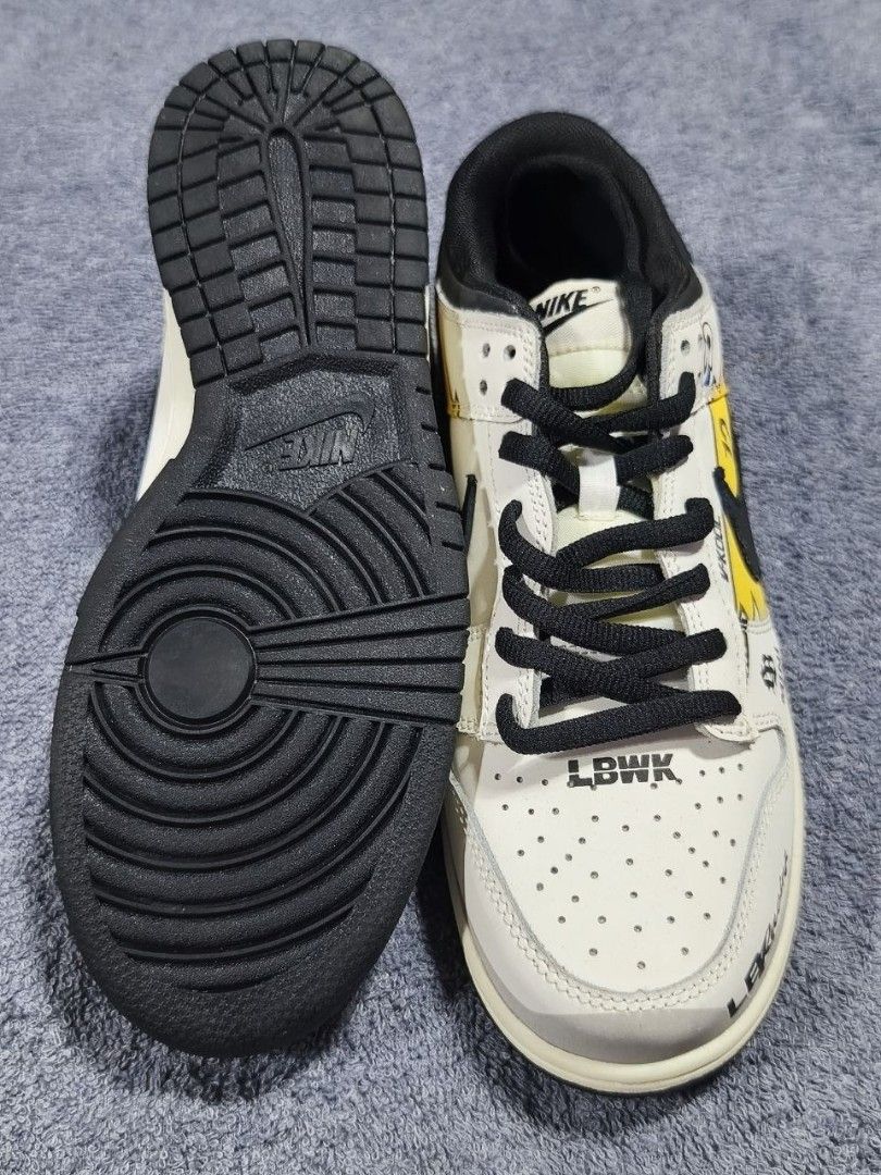 Nike Dunk Low LBWK & BAPE STA Sneakers (Category: Sneakers) located in Manila. Submitted by kikocastro37272 (Listing ID 1470694595, Image 3). Description: - Bundle includes 2 pairs of versatile sneakers, perfect for daily wear and street style - Pair 1: Cream upper, black laces, and striking LBWK text on the toe area - Pair 2: Clean white leather with black accents, BAPE STA tongue branding, and convenient lace locks - Both pairs feature durable 