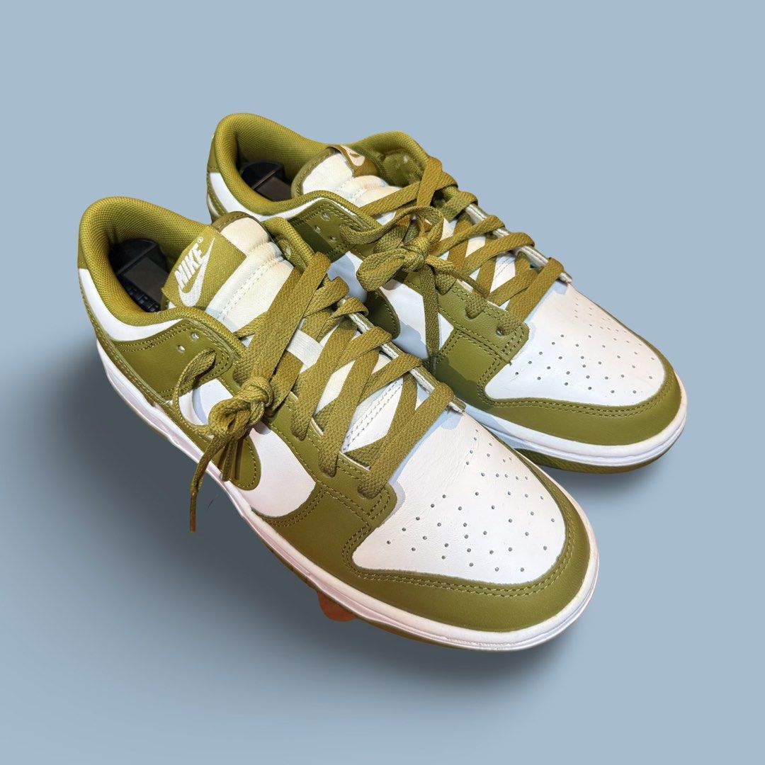 Nike Dunk Low Olive Green White (Category: Sneakers) located in Quezon City. Submitted by chey.mayuga (Listing ID 1470654761, Image 2). Description: - Model: Nike Dunk Low - Colorway: Olive Green / White - Design: Classic low-top with matching green laces and outsole - Materials: White leather base with crisp olive overlays - Details: Clean stitching and signature branding on tongue and heel - Condition: Brand new / Great everyday sneakers - Meet