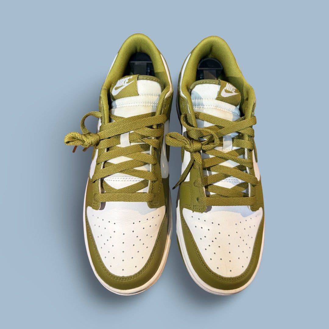 Nike Dunk Low Olive Green White (Category: Sneakers) located in Quezon City. Submitted by chey.mayuga (Listing ID 1470654761, Image 3). Description: - Model: Nike Dunk Low - Colorway: Olive Green / White - Design: Classic low-top with matching green laces and outsole - Materials: White leather base with crisp olive overlays - Details: Clean stitching and signature branding on tongue and heel - Condition: Brand new / Great everyday sneakers - Meet