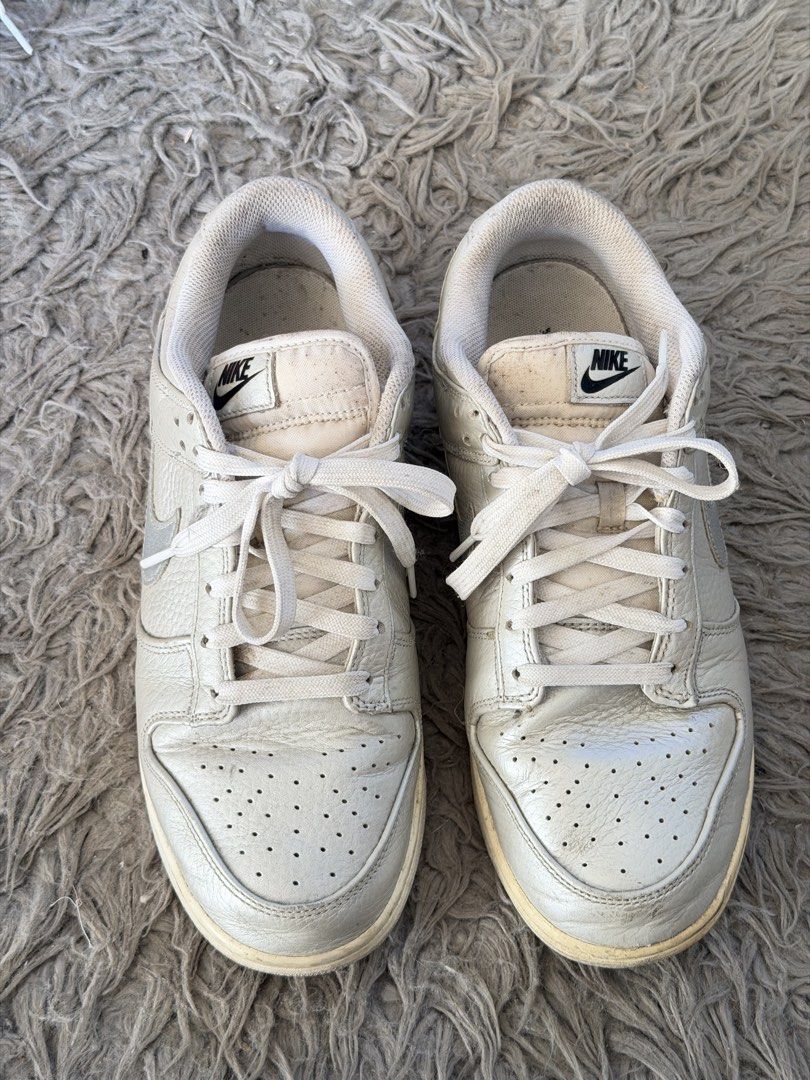 Nike Dunk Low SE Metallic Silver Size 10 Men's (Category: Sneakers) located in Manila. Submitted by cinnmoroll (Listing ID 1470597623, Image 3). Description: - Item: Nike Dunk Low SE - Color: Metallic Silver - Size: Men's 10 (US) / 28cm - Condition: Minimal creasing on uppers, noticeable yellowing on midsoles and outsoles, needs proper cleaning - Inclusions: Original box included - Price: ₱1,200.