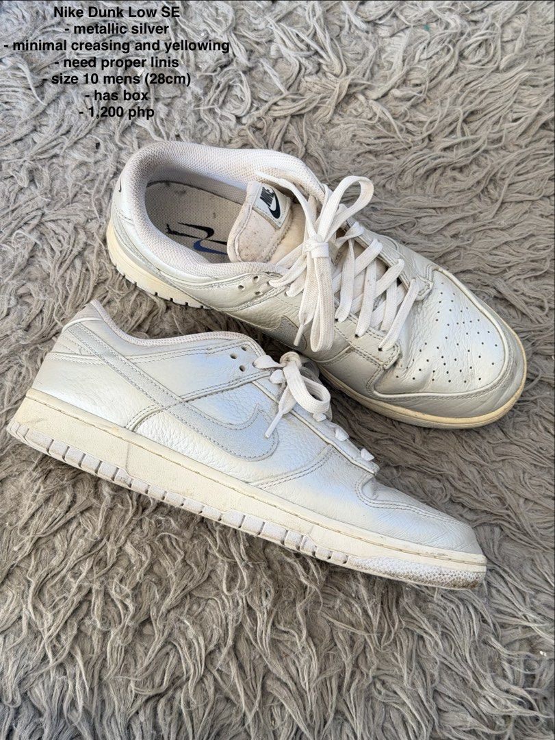 Nike Dunk Low SE Metallic Silver Size 10 Men's (Category: Sneakers) located in Manila. Submitted by cinnmoroll (Listing ID 1470597623, Image 1). Description: - Item: Nike Dunk Low SE - Color: Metallic Silver - Size: Men's 10 (US) / 28cm - Condition: Minimal creasing on uppers, noticeable yellowing on midsoles and outsoles, needs proper cleaning - Inclusions: Original box included - Price: ₱1,200.