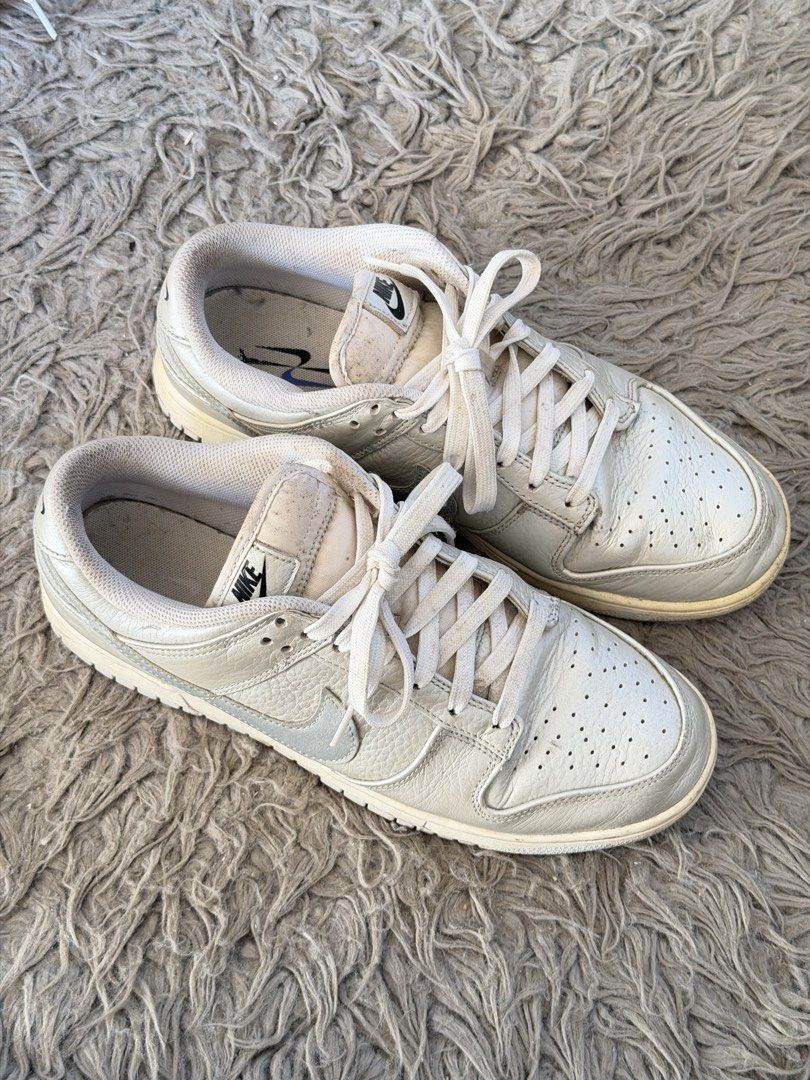 Nike Dunk Low SE Metallic Silver Size 10 Men's (Category: Sneakers) located in Manila. Submitted by cinnmoroll (Listing ID 1470597623, Image 2). Description: - Item: Nike Dunk Low SE - Color: Metallic Silver - Size: Men's 10 (US) / 28cm - Condition: Minimal creasing on uppers, noticeable yellowing on midsoles and outsoles, needs proper cleaning - Inclusions: Original box included - Price: ₱1,200.