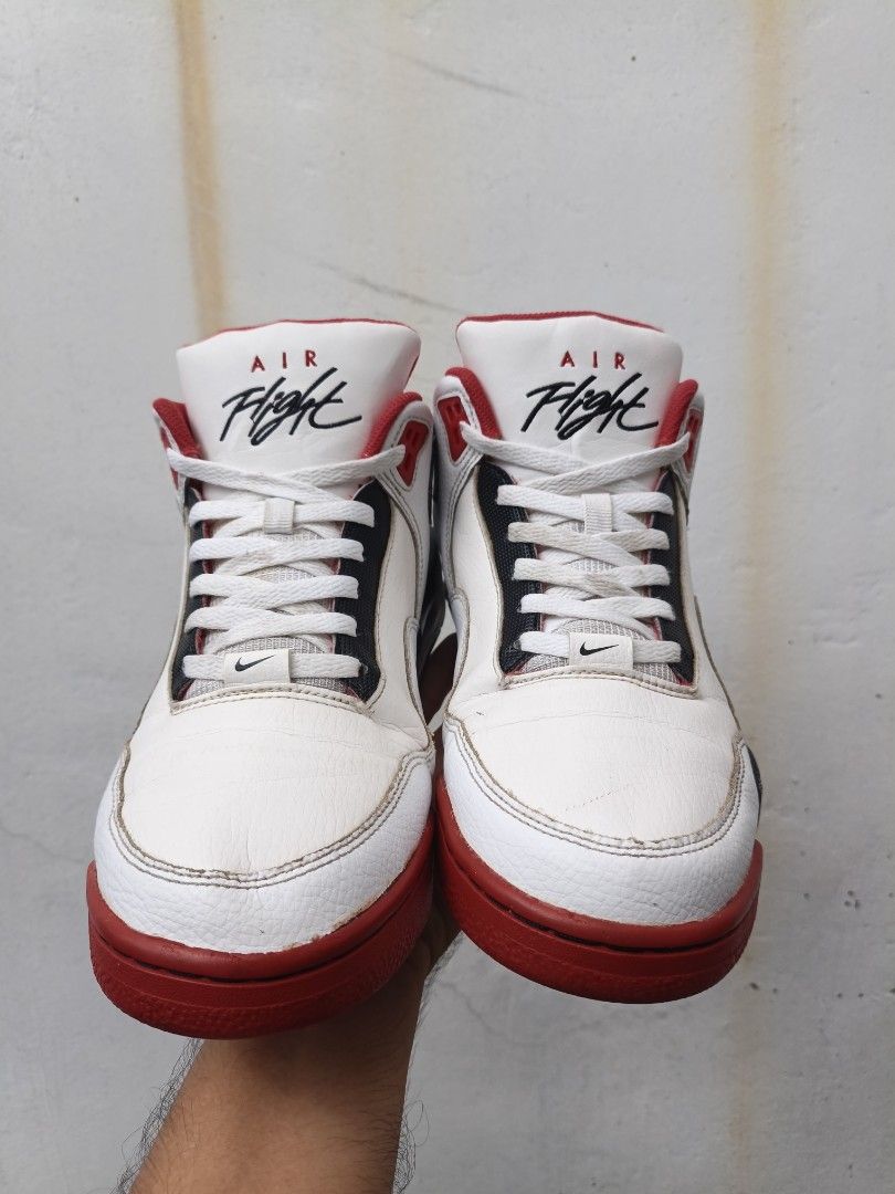 Nike Flight Legacy White Red Black Size 10 US (Category: Sneakers) located in Imus. Submitted by grindhouse.thriftshop (Listing ID 1470631898, Image 2). Description: - Brand/Model: Nike Flight Legacy - Colorway: White / Black / Red - Size: 10 US - Style: Mid-top silhouette with tumbled leather upper - Features: Visible Air unit in heel, classic Air Flight tongue branding, and embroidered Nike Air logo on the back - Condition: Minor dirt on soles 