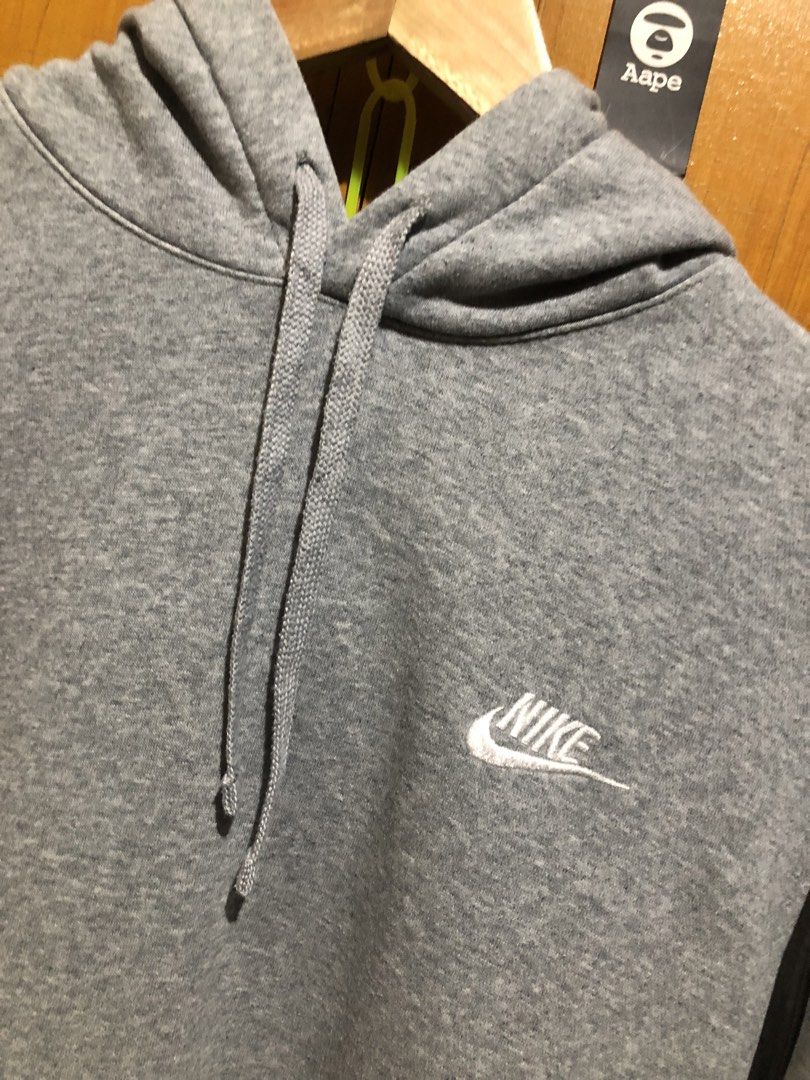 Nike Grey Hoodie (Category: Hoodies) located in Manila. Submitted by streetwear_only (Listing ID 1470727674, Image 2). Description: - Brand: Nike - Style/Model: Pullover Hoodie (BV2654-063) - Color: Grey with embroidered white logo - Size: Large - Origin: Made in Jordan - Features: Adjustable drawstring hood, front kangaroo pocket, ribbed cuffs and hem - Condition: Clean fabric, great everyday streetwear staple.