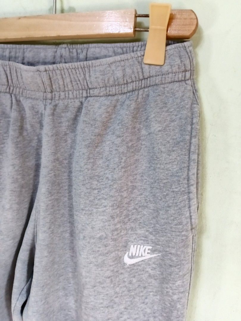 Nike Grey Sweatpants Joggers Size M (Category: Joggers) located in Manila. Submitted by onewikstraight (Listing ID 1470599331, Image 3). Description: - Brand: Nike - Item: Classic Fit Sweatpants - Color: Grey with white embroidered logo on left thigh - Size: Medium - Material: 80% Cotton, 20% Polyester - Origin: Made in Jordan - Condition: Great for casual wear and lounging 750+sf pm 📨📥.