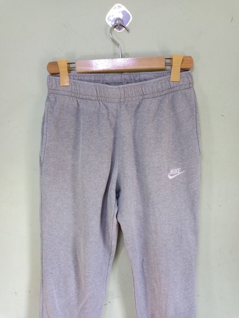 Nike Grey Sweatpants Joggers Size M (Category: Joggers) located in Manila. Submitted by onewikstraight (Listing ID 1470599331, Image 1). Description: - Brand: Nike - Item: Classic Fit Sweatpants - Color: Grey with white embroidered logo on left thigh - Size: Medium - Material: 80% Cotton, 20% Polyester - Origin: Made in Jordan - Condition: Great for casual wear and lounging 750+sf pm 📨📥.