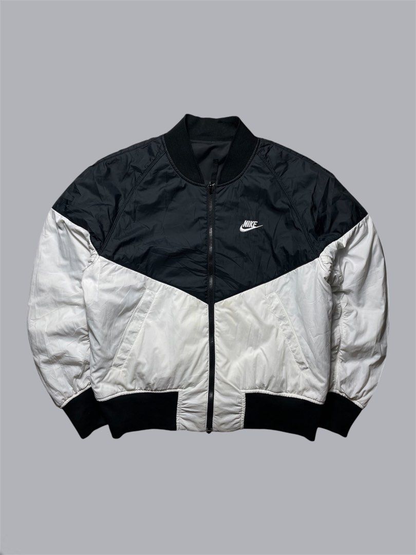 Nike Insulated Reversible Bomber Jacket (Category: Coats, Jackets and Outerwear) located in Quezon City. Submitted by renovare.196 (Listing ID 1470656326, Image 2). Description: Nike Insulated Reversible Bomber Jacket Excellent Condition Color Rate: 9.8/10 Issue: Not visible stain Authentic/Legit Measurements • Width: 23 • Length: 25 Price: 1500 obo DM IF INTERESTED📥.