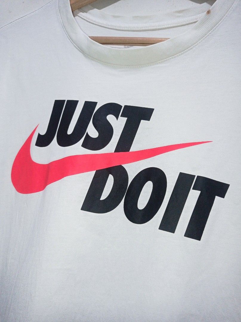 Nike JDI (pink swoosh) (Category: Tshirts & Polo Shirts ) located in Pasig City. Submitted by pureselectionapparel (Listing ID 1470642844, Image 2). Description: Nike JDI (pink swoosh) 🏷️ Size XL on tag Med-large best fit (21W 27.5L) Excellent Condition Issue: Hard minimal stain (check last photo) 350 plus ship Location: Pasig City.