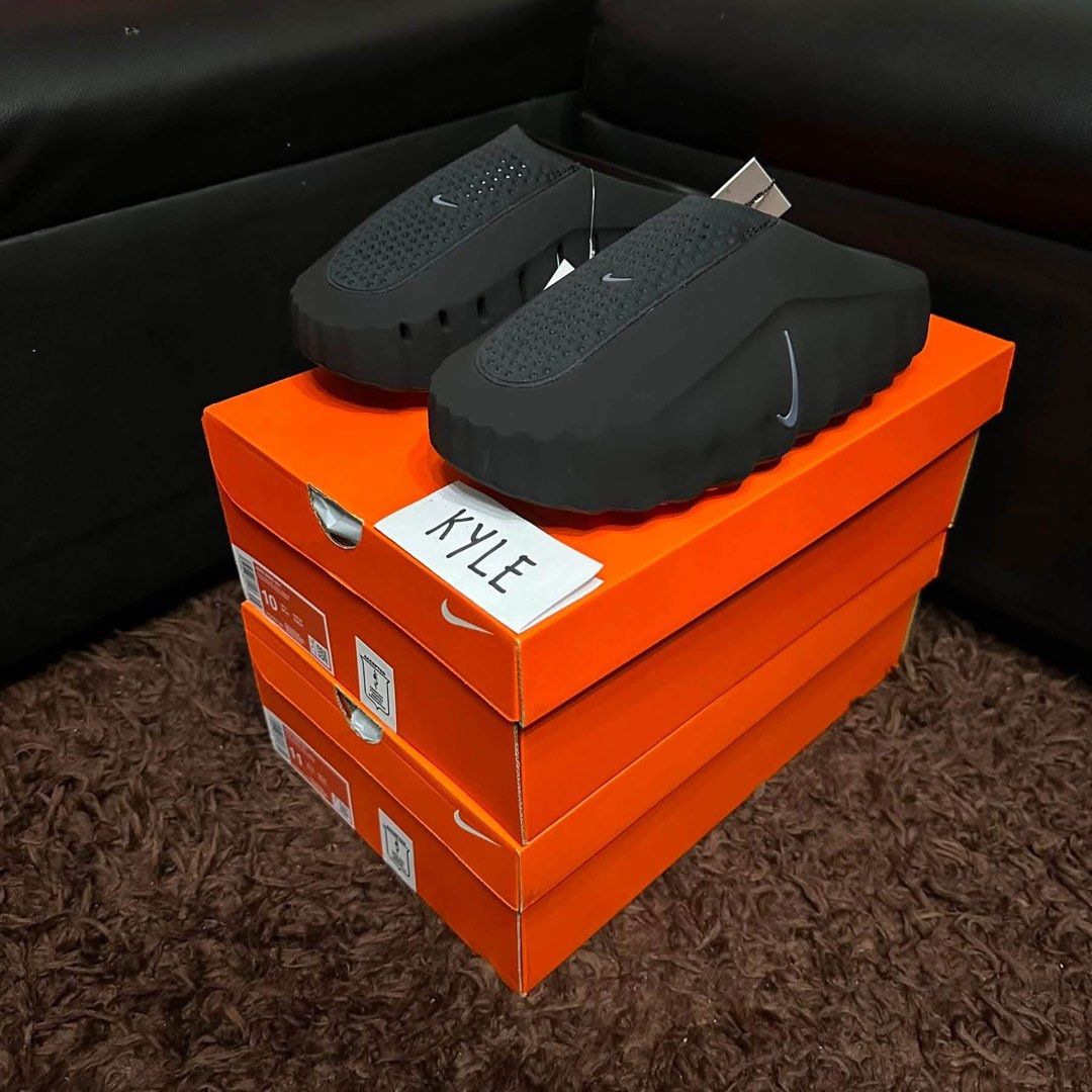 Nike Mind 001 Chrome Black (Category: Slippers & Slides) located in Pasig City. Submitted by kekss (Listing ID 1470657643, Image 1). Description: WTS / FOR SALE Nike Mind 001 Chrome Black 10M (2) - 7,000 each brand new local released complete w invoice PM ME🔑 pasig area lalamove / grab.