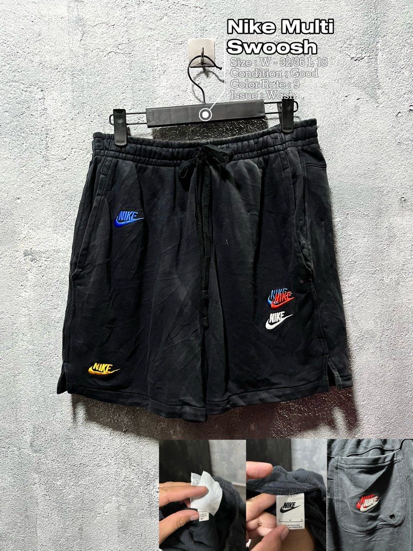 Nike Multi Swoosh Black Shorts Size L (Category: Shorts) located in Lubao. Submitted by genjithrifted (Listing ID 1470591656, Image 1). Description: - Brand: Nike - Color: Black with scattered multi-colored embroidered swooshes - Size: Large (tag intact) - Material/Origin: Made in Pakistan - Features: Adjustable drawstring waistband, deep side pockets, and one back pocket with a mini Nike logo patch - Condition: Slight wash wear overall, but stil