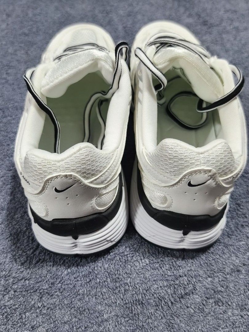 Nike P-6000 White Black Sneakers (Category: Sneakers) located in Manila. Submitted by kikocastro37272 (Listing ID 1470696069, Image 2). Description: - Brand: Nike P-6000 - Colorway: White and Black (Clean and versatile) - Style: Chunky retro runner aesthetic with mesh panels and structured overlays - Details: Features unique striped laces and classic branding on tongue and heel counter - Comfort: Cushioned soles for all-day wear - Condition: Grea