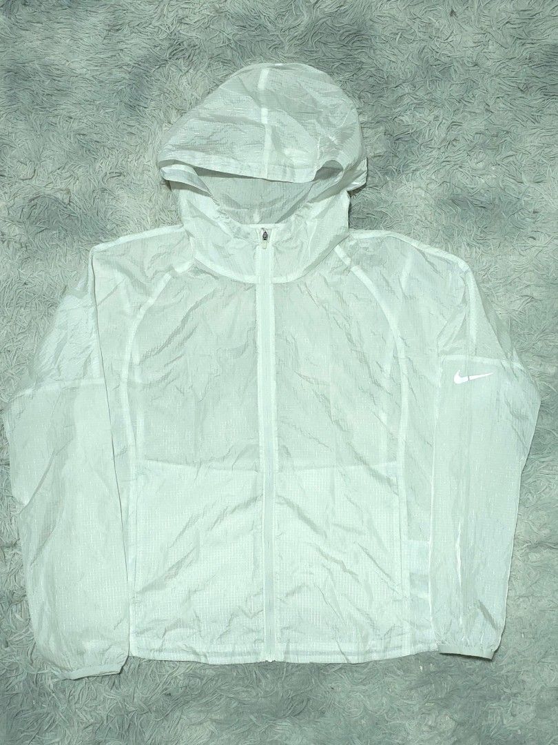 Nike Packable Windbreaker (Category: Coats, Jackets and Outerwear) located in Abulug. Submitted by humanwhosellthings (Listing ID 1470560143, Image 1). Description: NIKE WOMENS PACKABLE WINDBREAKER JACKET ✅️Size: Medium ✅️Dimes: 20W x 24L ✅Condition: Excellent ✅Issue: minimal scratch lang di halata ✅Color Rate: 9.8/10.