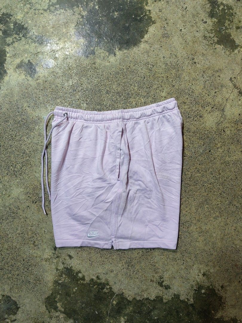 Nike Pastel Pink Drawstring Cotton Athletic Shorts (Category: Shorts) located in Matnog. Submitted by erasmoarnold.b9c007 (Listing ID 1470646953, Image 1). Description: - Brand: Nike - Color: Pastel Pink - Material: Soft, comfortable cotton - Waistband: Stretchy with adjustable drawstring - Features: Convenient side pockets, small embroidered Nike swoosh logo on lower left leg - Fit: Relaxed fit through the thighs - Condition: Great for workouts 
