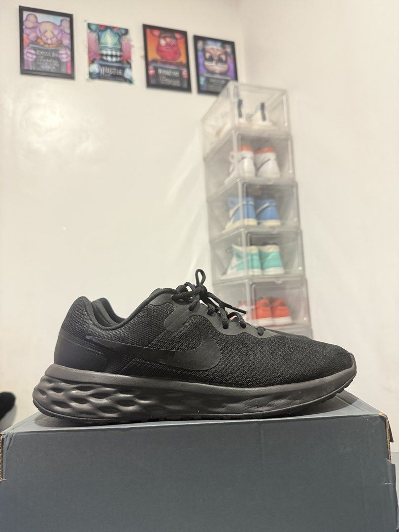 Nike Revolution 6 Black Running Shoes (Category: Sneakers) located in Manila. Submitted by riyhun (Listing ID 1470696036, Image 1). Description: - Brand: Nike - Color: All-Black - Size: US 12.5 / UK 11.5 / EUR 47 - Material: Breathable mesh upper with cushioned foam sole - Condition: Excellent, clean uppers with minimal tread wear - Ideal for: Running, gym sessions, and daily wear - Fit: Standard lace-up.