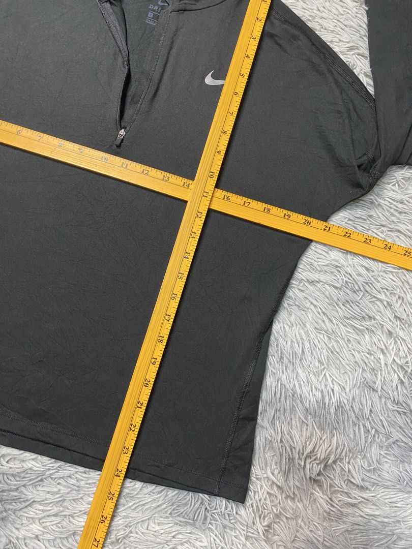 Nike Running Dri-Fit Half Zip Pullover (Category: Longsleeves) located in Solano. Submitted by solothrifting (Listing ID 1470683141, Image 3). Description: Nike Running Dri-Fit Half Zip Pullover Condition: 9.5/10 Size on tag: M Womens Measurements in photos.