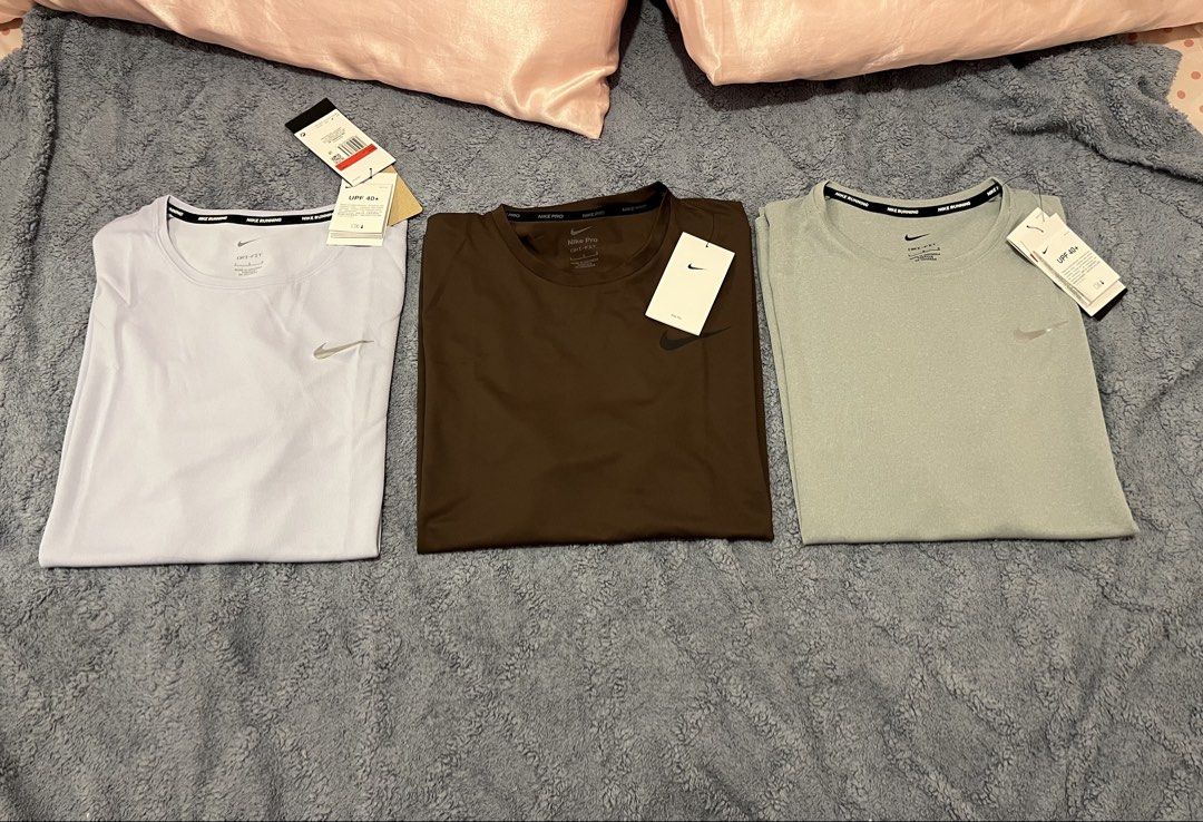 Nike Running shirt (Category: Activewear) located in Manila. Submitted by trying2bbttr (Listing ID 1470678444, Image 2). Description: Brand new - L & XL available size Nike Pro Dri-FIT Men’s Short-Sleeve Top - Baroque Brown - 1.5k Nike Dri-FIT UV Miler Men’s Short-Sleeve Running Top - Grey Fog & Ghost (White) - 1.2k Can give discount if get more than 1.