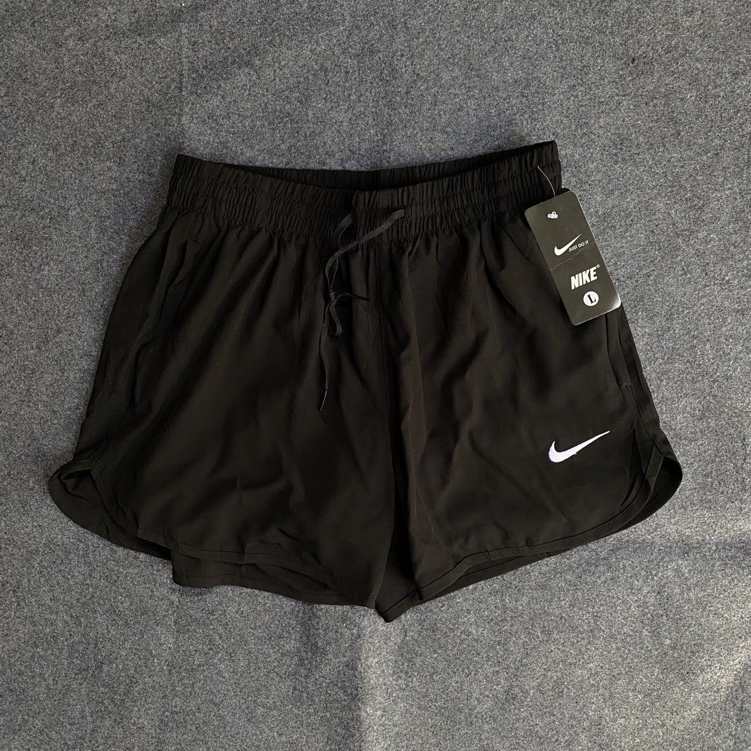 Nike Running Short (Category: Shorts) located in Cebu City. Submitted by lawydthrift (Listing ID 1470685704, Image 2). Description: Large on tag with inner.
